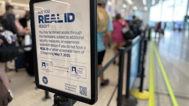REAL ID Enforcement Signs posted along the security checkpoint lines at Charlotte-Douglas...